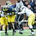 Michigan tight end Devin Funchess loses a shoe as he runs the ball during spring practice at Michigan Stadium on Saturday, April 13, 2013. Melanie Maxwell I AnnArbor.com
